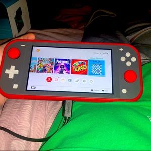 nintendo switch + supreme bag.